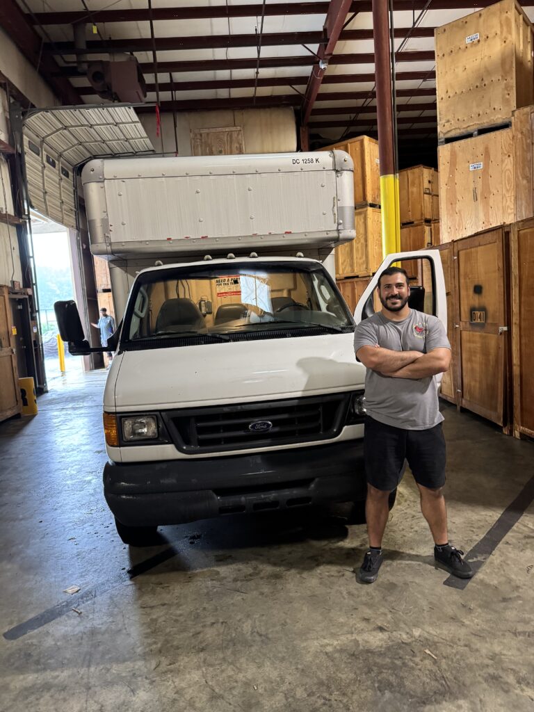 Smooth Movers DMV owner Baris Safoglu with his box truck